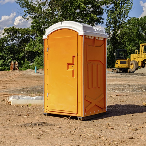 how often are the portable restrooms cleaned and serviced during a rental period in Lenox